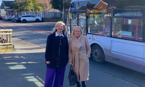 Harriett Baldwin MP and Councillor Karen Hanks at the Leigh Sinton bus-stop