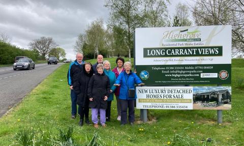 Harriett Baldwin MP with residents at the A46 near Long Carrant Residential Park 